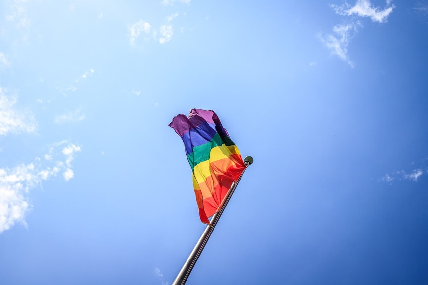 Pride flag being waved proudly